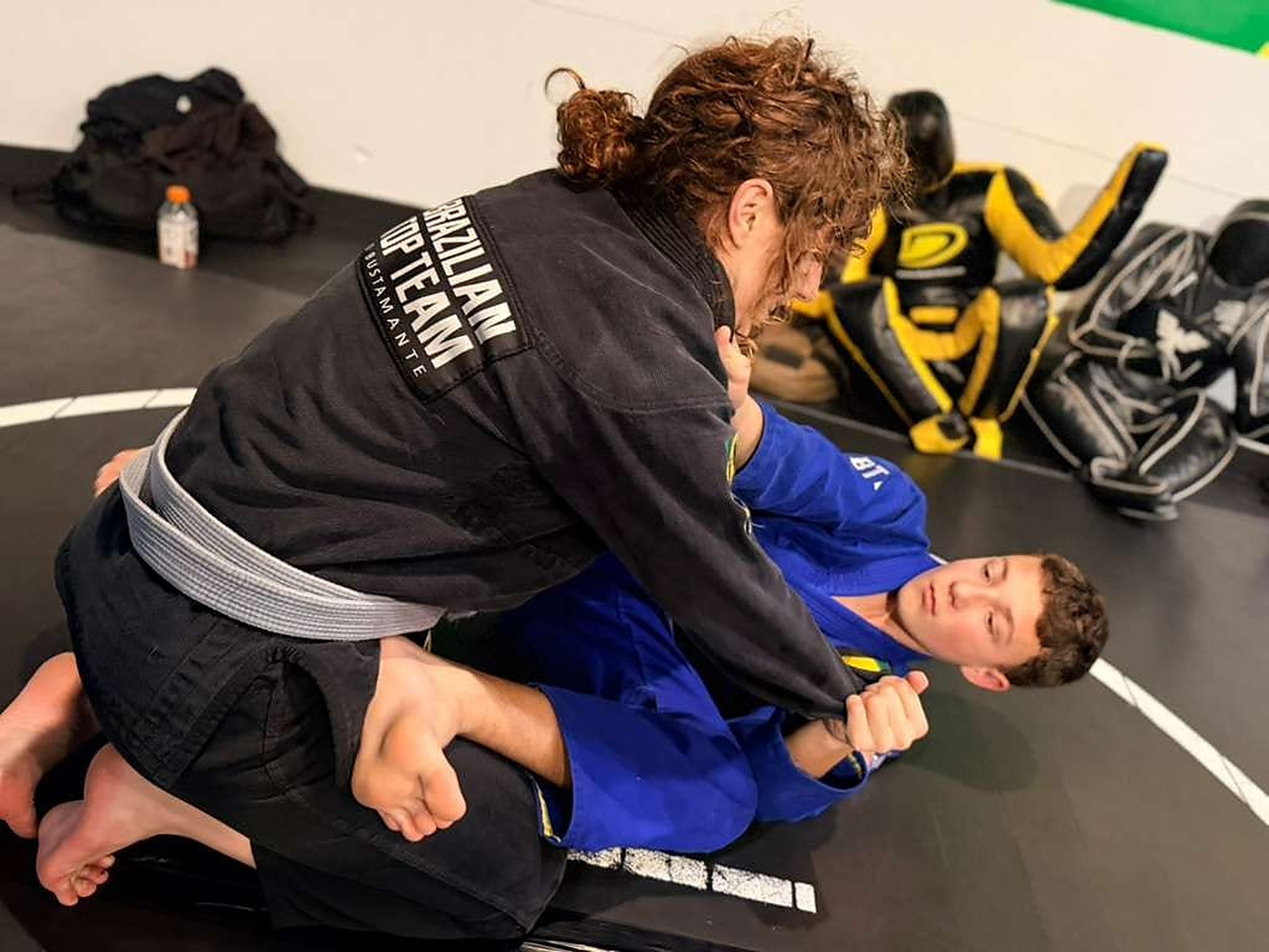 A coach teaching from guard