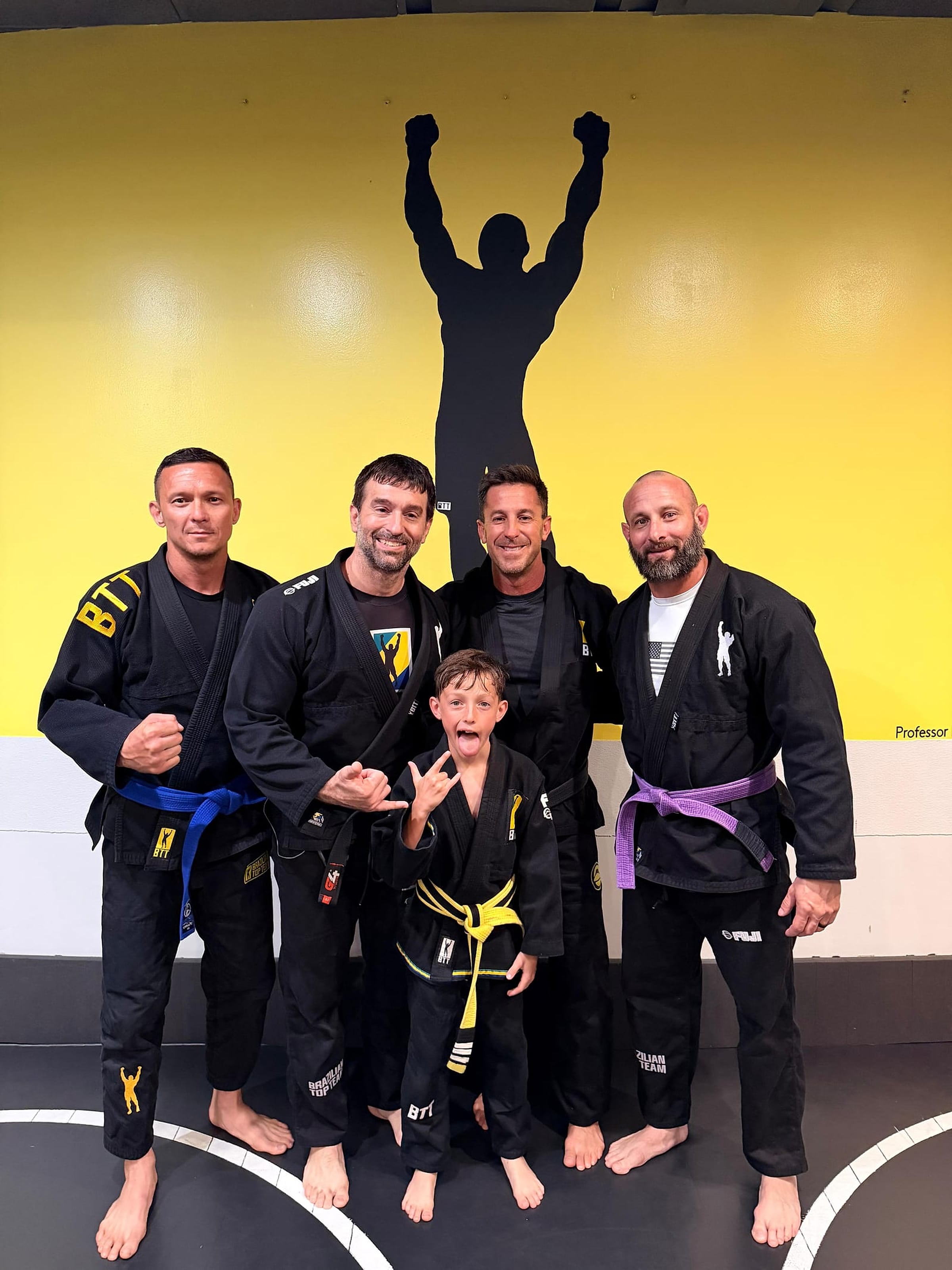 Coaches with a young student at BTT Merritt Island