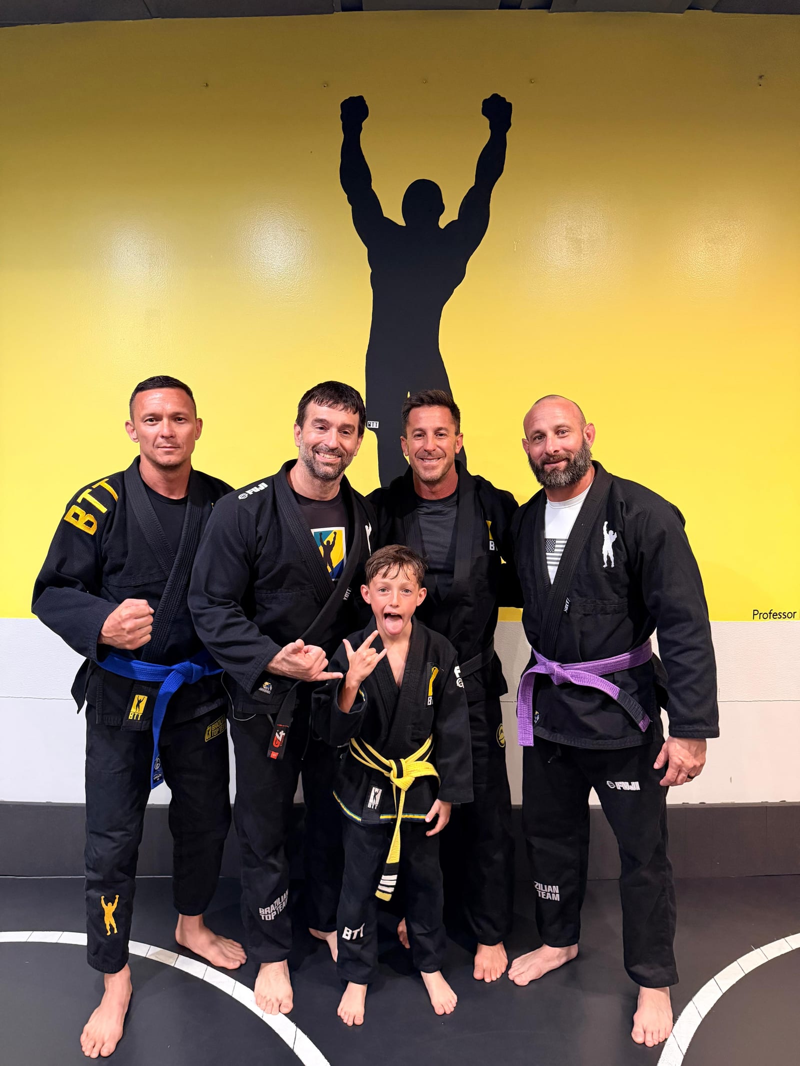 Coaches with a young student