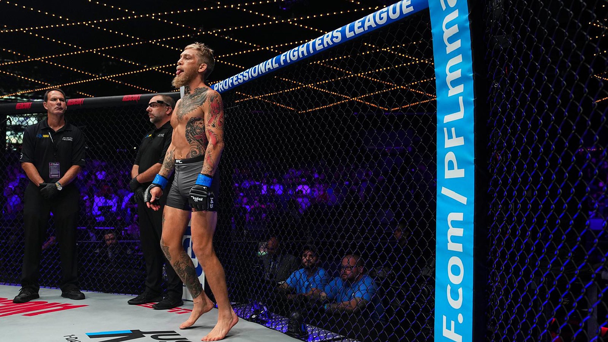Coach David Zelner walking out in the cage at a Professional Fighters League event