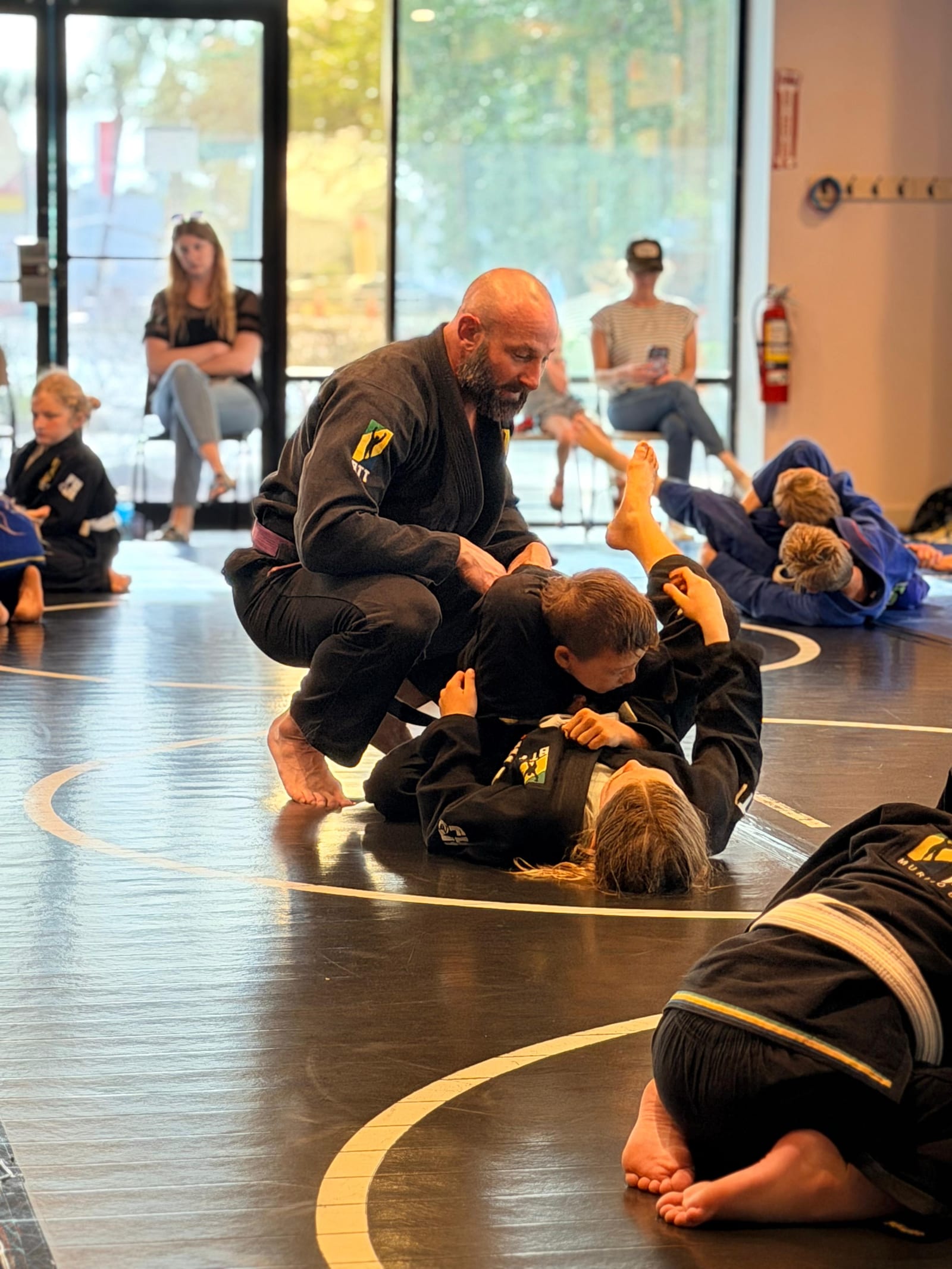 A coach running the kids class
