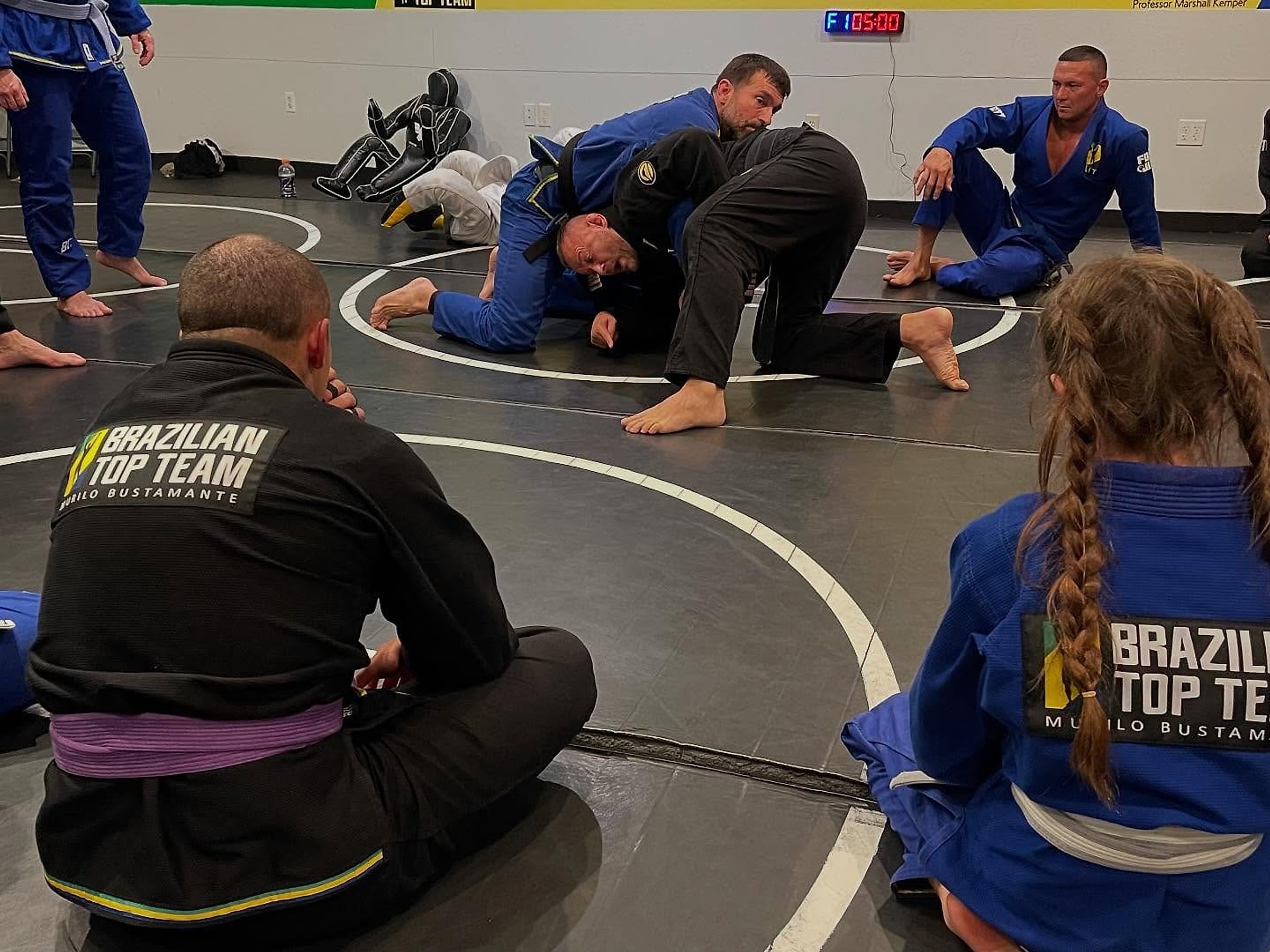 Coaches working with the class at BTT Merritt Island
