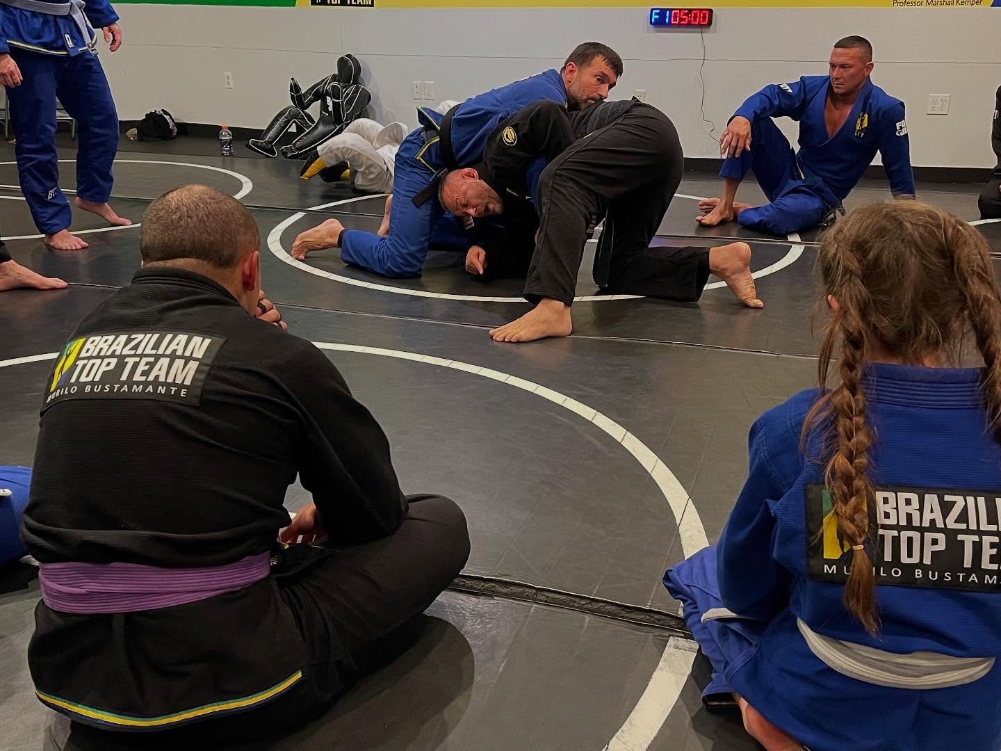 Coaches working with a class