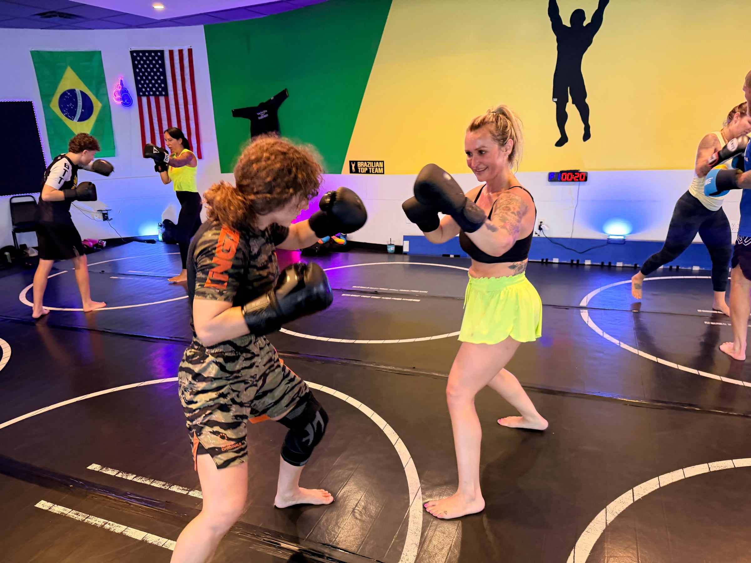 Two students sparring during the women's class